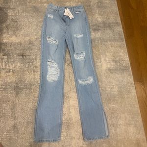 Women’s light wash distressed jeans size 4